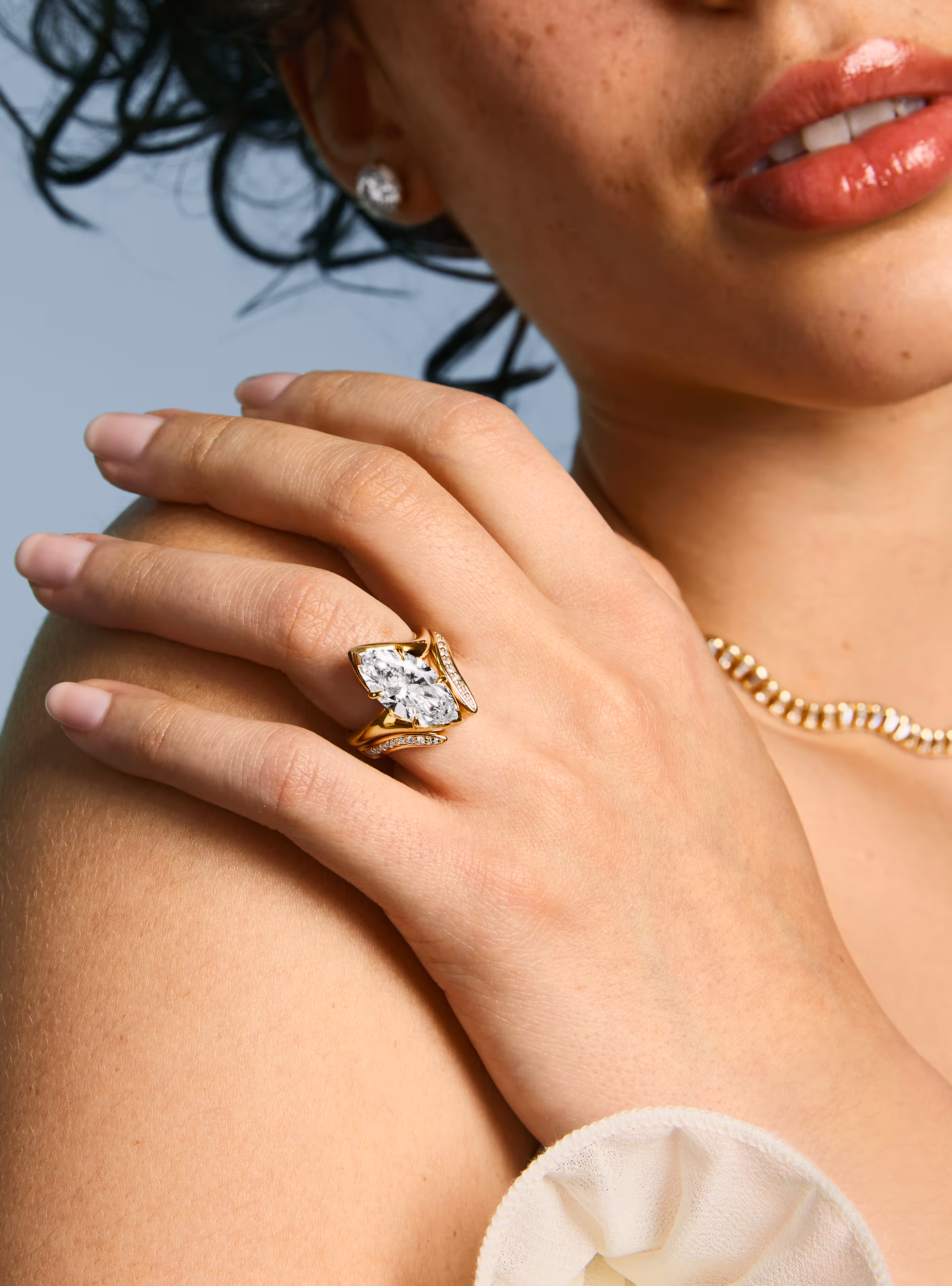 The Calla showcase featuring a lifestyle image of an engagement ring